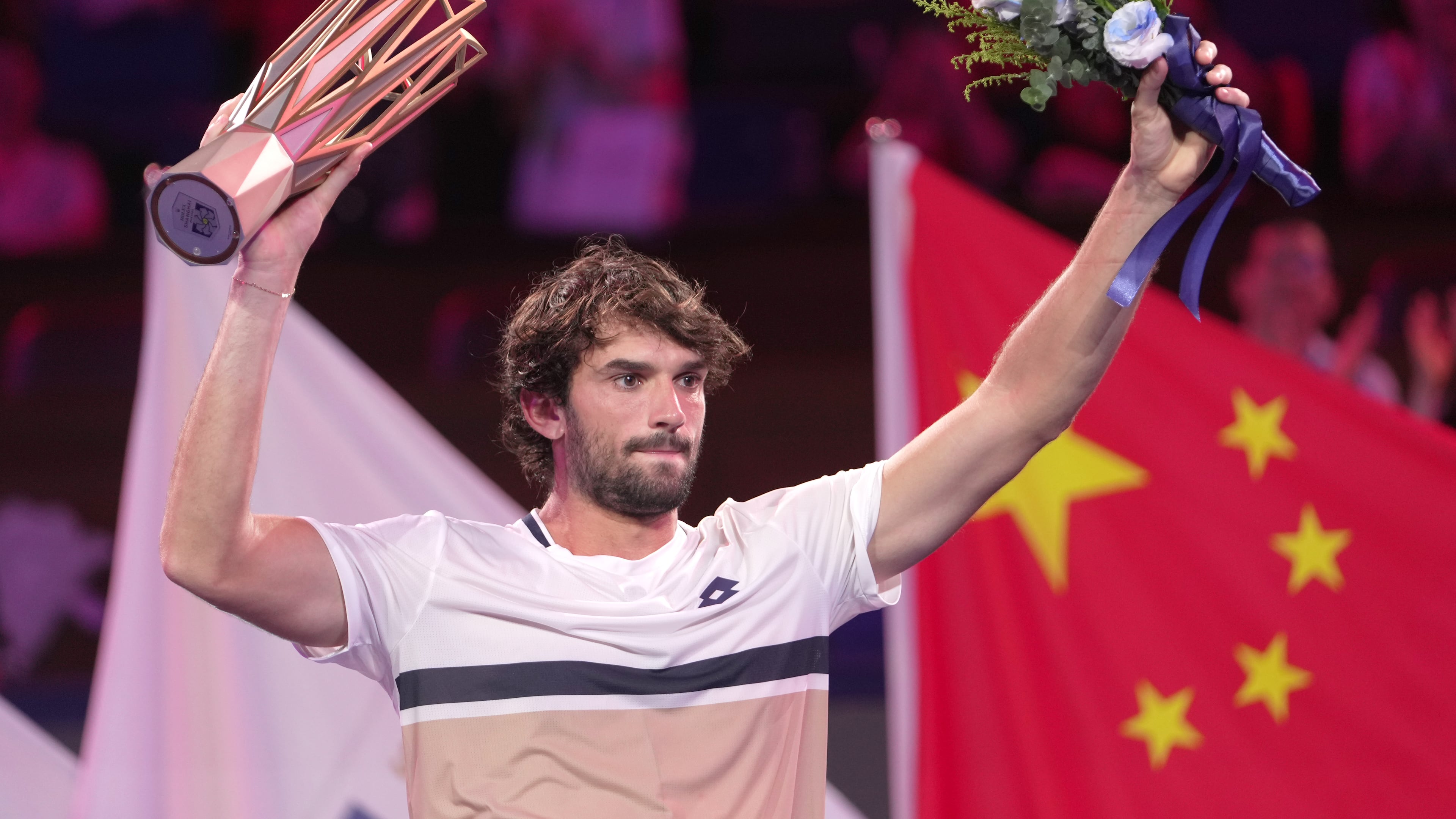 Valentin Vacherot of Monaco celebrates with the trophy after winning the final of the Shanghai Masters tennis tournament defeating Arthur Rinderknech of France at Qizhong Forest Sports City Tennis Center, in Shanghai, China, Sunday, Oct. 12, 2025. (AP Photo/Andy Wong)