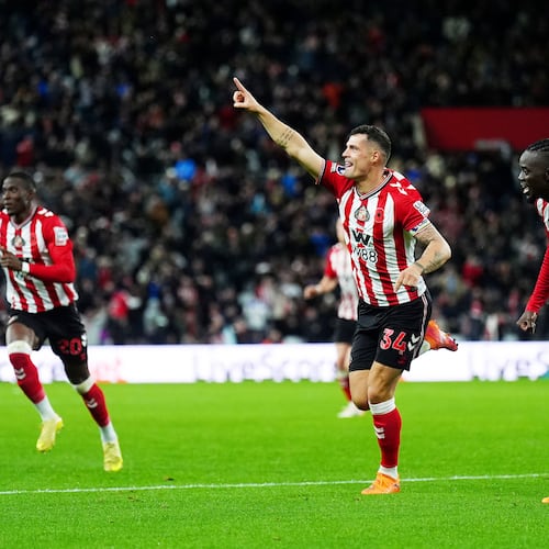 Sunderland's Granit Xhaka, center, celebrates scoring during the English Premier League soccer match between Sunderland and Everton in Sunderland, England, Monday Nov. 3, 2025. (Owen Humphreys/PA via AP)