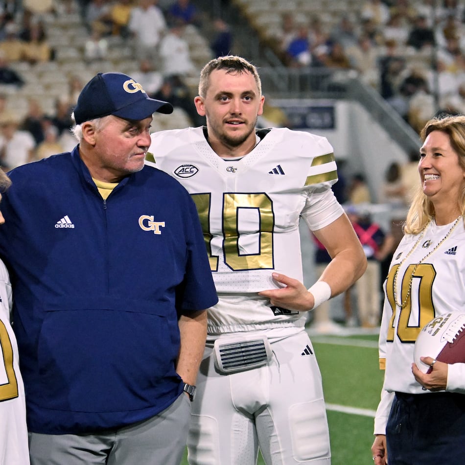 Georgia Tech quarterback Haynes King and his family react during a senior night event prior to the final regular-season home game against Pittsburgh at Bobby Dodd Stadium, Saturday, Nov. 22, 2025, in Atlanta. (Hyosub Shin/AJC)