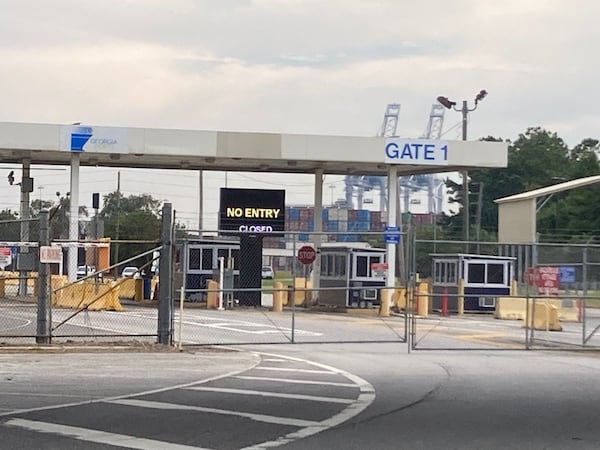 Fencing blocks a gate at the Georgia Ports Authority's Garden City Terminal, where union dockworkers went on strike in October. Terminals in Savannah and Brunswick remained closed over the three-day work stoppage. (Adam Van Brimmer/The Atlanta Journal-Constitution/TNS)
