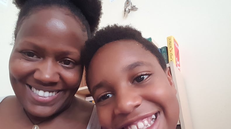 Charlena E. Jackson shares a happy moment with her son, 11-year-old Elijah. CONTRIBUTED