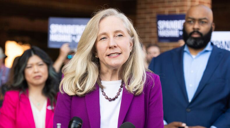 FILE - Democratic gubernatorial candidate Abigail Spanberger speaks to members of the press on the first day of early voting in Henrico County, Sept. 19, 2025. (Mike Kropf /Richmond Times-Dispatch via AP, File)