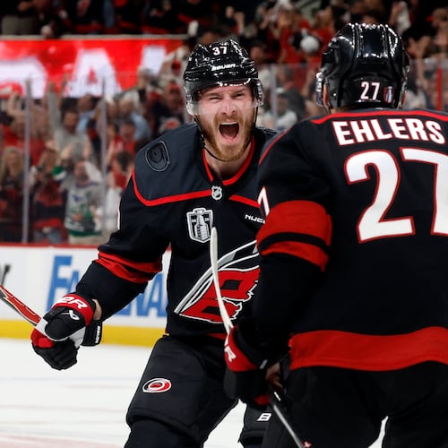 Carolina Hurricanes' Andrei Svechnikov (37) celebrates after his goal with Nikolaj Ehlers (27) during the second period in Game 5 of the NHL hockey Stanley Cup Final series against the Vegas Golden Knights in Raleigh, N.C., Thursday, June 11, 2026. (AP Photo/Karl DeBlaker)