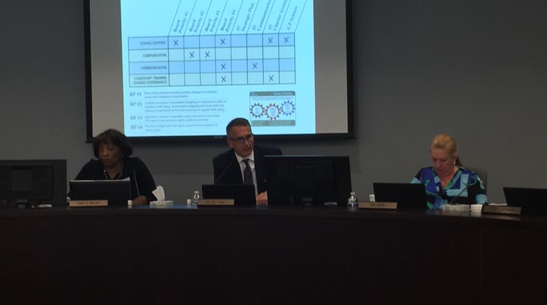 Fulton Superintendent Jeff Rose (center) recommended the school board adopt a $1 billion budget that calls for a pay raise for all employees during Thursday’s board meeting.