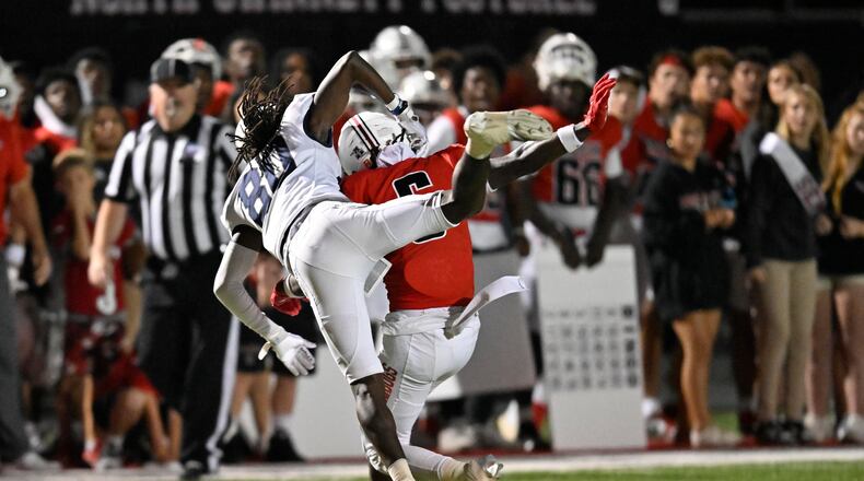 N. Gwinnett #80 breaks up the pass reception on fourth down to secure victory agains Norcross during a GHSA region football game in Suwanee, GA., on Friday, Oct. 25, 2024. (Jim Blackburn for the AJC)