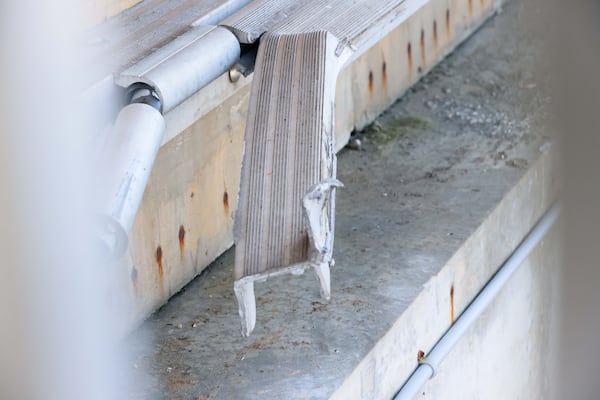 Remnants of the collapsed gangway are visible on Sapelo Island on Tuesday, Oct. 22, 2024. (Miguel Martinez/AJC)