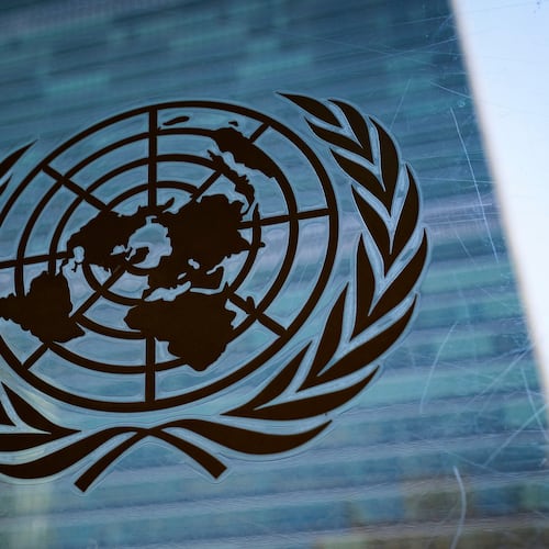 FILE - The symbol of the United Nations is displayed outside the Secretariat Building, Feb. 28, 2022, at United Nations Headquarters. (AP Photo/John Minchillo, File)