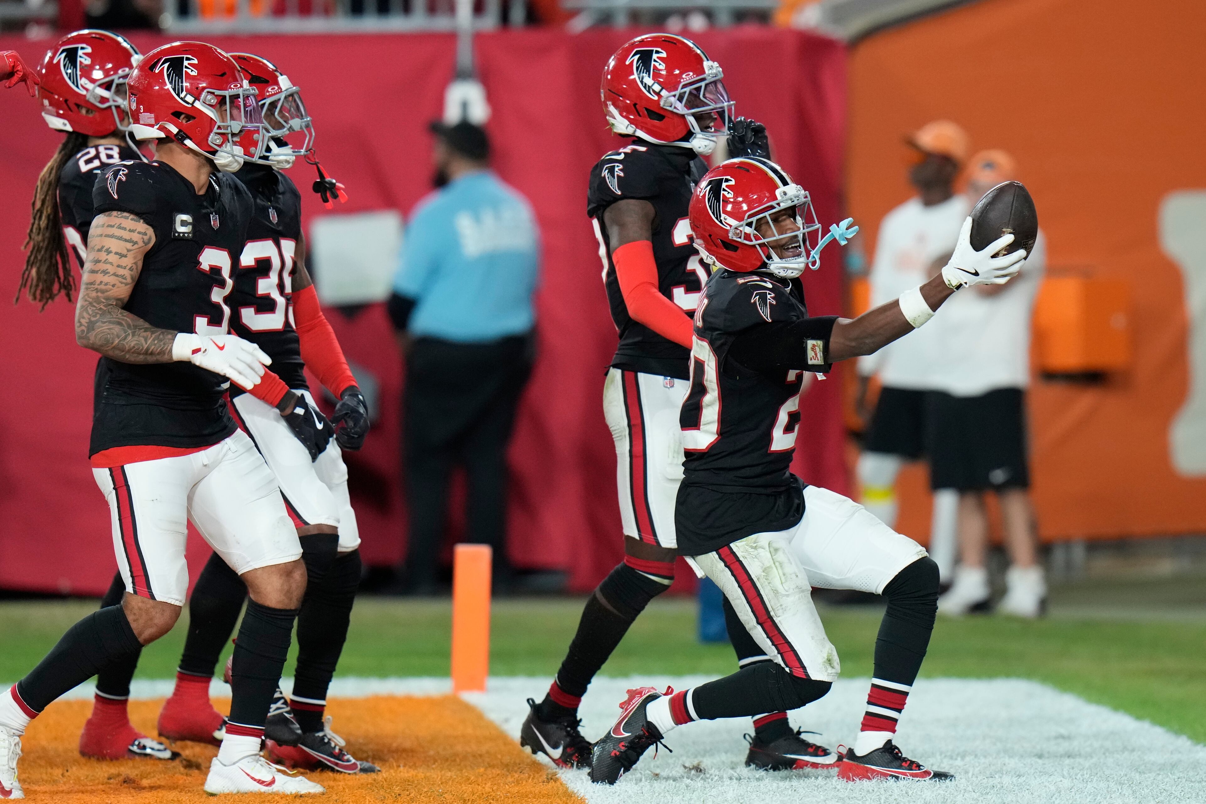 Atlanta Falcons cornerback Dee Alford (20) celebrates his interception against the Tampa Bay Buccaneers during the second half of an NFL football game, Thursday, Dec. 11, 2025, in Tampa, Fla. (AP Photo/Chris O'Meara)
