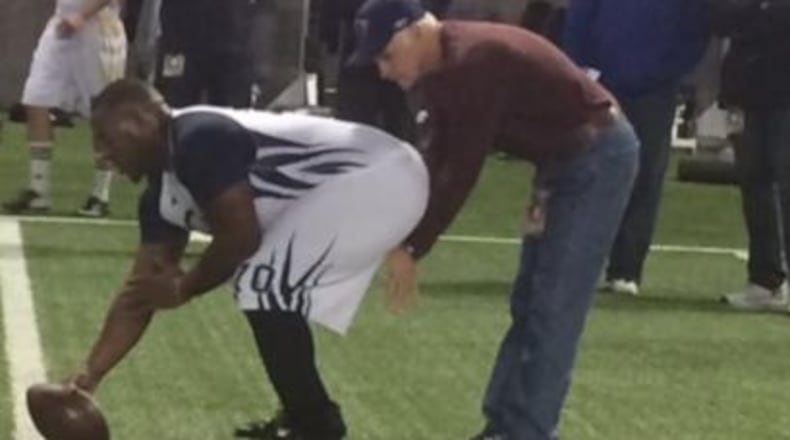 Georgia Tech’s Shaquille Mason snapping to New England draft evaluator and former offensive line coach Dante Scarnecchia at Tech’s Pro Day. (By D. Orlando Ledbetter/DLedbetter@ajc.com)