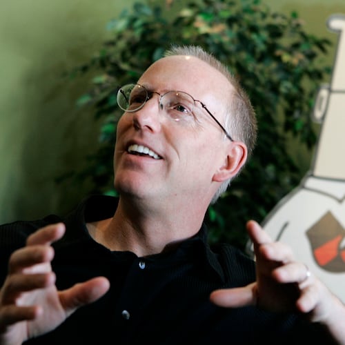 FILE - Scott Adams, creator of the comic strip Dilbert, talks about his work at his studio in Dublin, Calif., on Oct. 26, 2006. (AP Photo/Marcio Jose Sanchez, File)