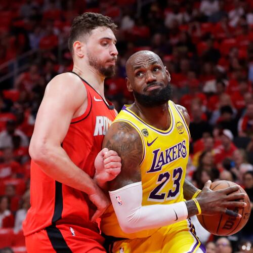 Los Angeles Lakers forward LeBron James (23) drives to the basket in front of Houston Rockets center Alperen Sengun, left, during the first half of Game 3 in a first-round NBA playoffs basketball series Friday April 24, 2026, in Houston. (AP Photo/Michael Wyke)