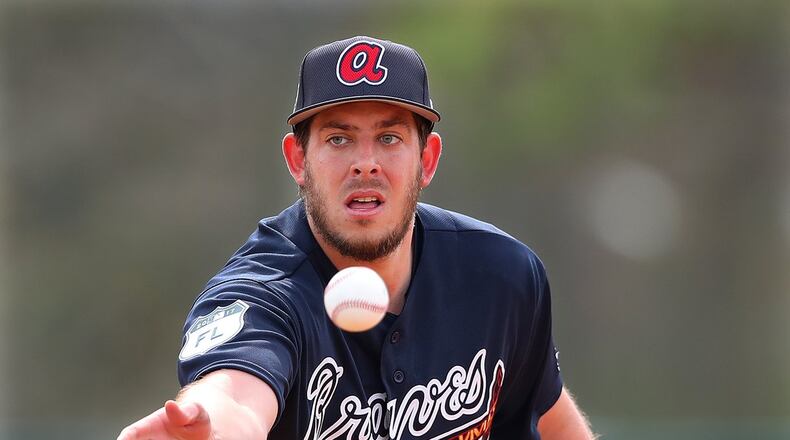 Braves pitcher Aaron Blair, pictured in an early spring training workout, recovered after a leadoff homer in the first inning Thursday to pitch a solid 2 2/3 innings against the Yankees. (Curtis Compton/ccompton@ajc.com)
