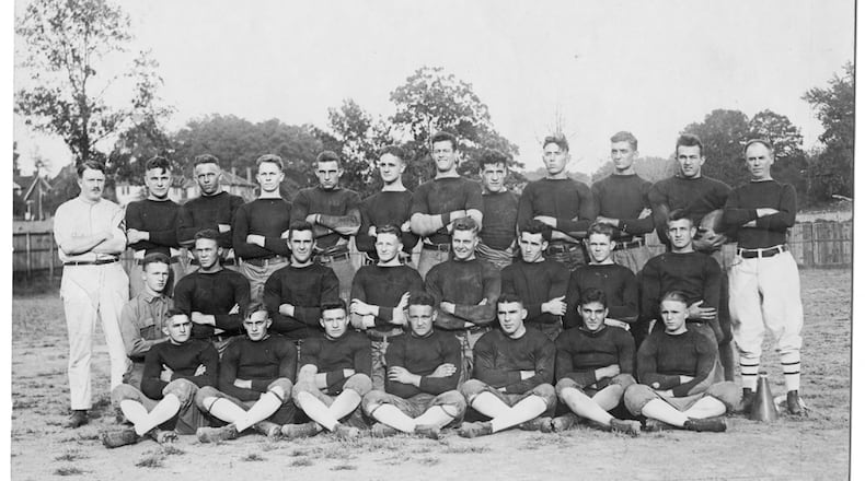 Georgia Tech's 1918 football team. Identifications from the Georgia Tech Archives:
Left to Right, Front Row: Prescott, W. Smith, Huff Hunes, Nesbit, Ferst, Scarboro; Second Row: Arnall, Ingr, Day, Kidd, Barron, Rogers, Bastein, Flowers; Third Row: Wood (line coach), Lynch, Webb, Granger, A. Stanton, Davis, Doyal, Guyon, Cobb, --, Fincher (captain), Heisman (Coach) (Georgia Tech Archives)