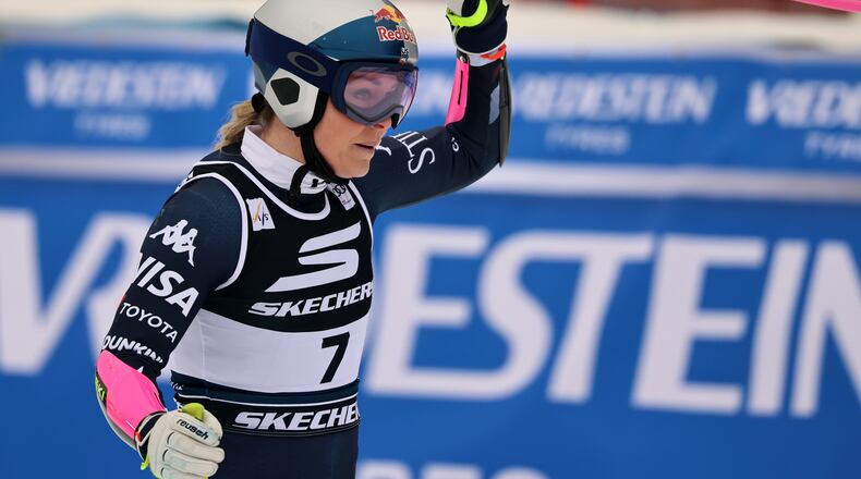 United States' Lindsey Vonn celebrates at the finish area of an alpine ski, women's World Cup Super G, in Tarvisio, Italy, Sunday, Jan. 18, 2026. (AP Photo/Marco Trovati)