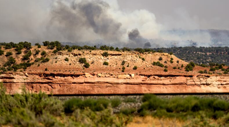 The Snyder Fire burns near Thompson Springs, Utah, on Sunday, June 28, 2026. (AP Photo/Noah Berger)