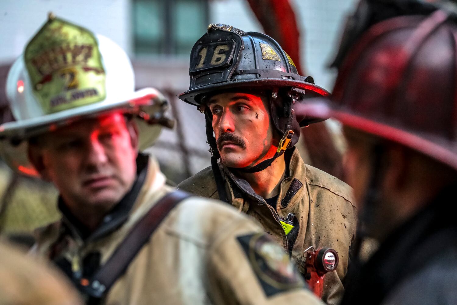 A large fire engulfed three homes in a northwest Atlanta neighborhood Wednesday morning, Oct. 11, 2023, officials said. Crews with Atlanta fire responded around 6:20 a.m. to a structure fire in the 600 block of Tazor Street, according to Battalion Chief Derek Hullender. At the scene, one house was destroyed and the fire had already spread to two neighboring homes. (John Spink / John.Spink@ajc.com) 


