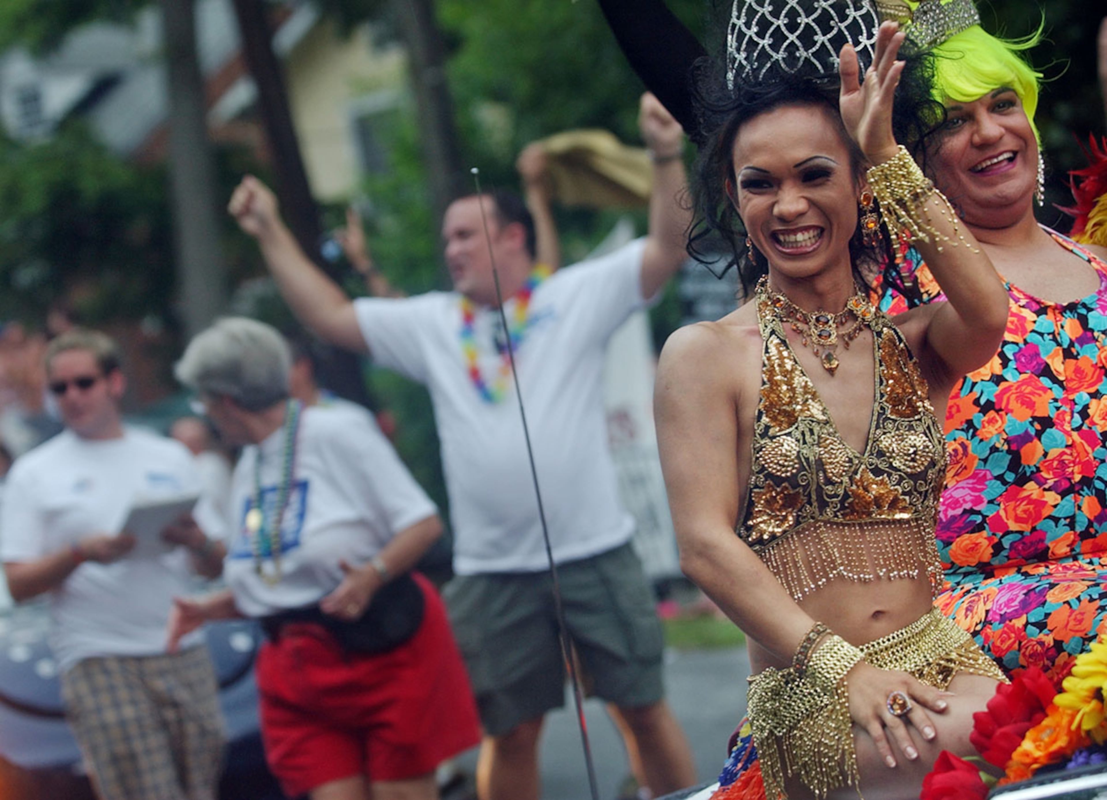 Isabella Diamante (left), Miss Gay Cobb County, and Fajita Marinara, Miss Corn Cobb County, march in the Atlanta Pride Parade in 2006. AJC / 2006
