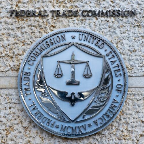 FILE - The official seal of the Federal Trade Commission is seen on an office building in Washington, Feb. 13, 2026. (AP Photo/Cliff Owen, File)