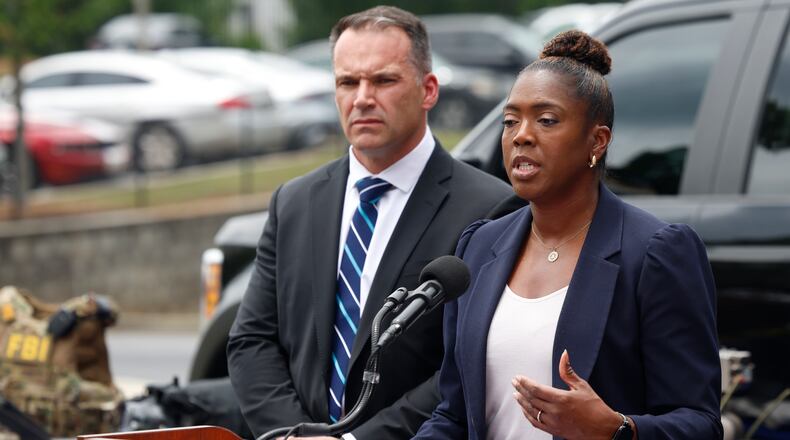 FBI Atlanta Special Agent in Charge Marlo Graham, right, and FBI Atlanta Assistant Special Agent in Charge Shawn Matthews, left, address the media at a press conference Thursday about the FBI’s safety plans for the 2026 FIFA World Cup in Atlanta. They displayed drones and other security gear and technology they might use during the six-week event. (Akili-Casundria Ramsess for the AJC)