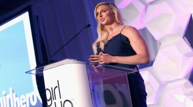 Wrestling star Charlotte Flair helped a military family's children have a nice late Christmas.