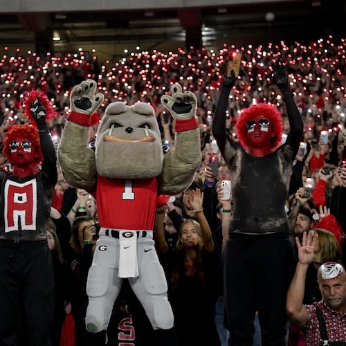 Georgia fans light up the stadium at the start of the fourth quarter in a November 2024 game against Tennessee at Sanford Stadium. (Hyosub Shin/AJC)