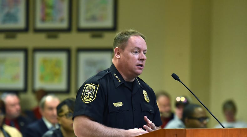 Chief of Police James Conroy stands before commissioners during DeKalb County Commission meeting last week. Commissioners asked county police to compile crime statistics surrounding late-night bars before reducing their hours. HYOSUB SHIN / HSHIN@AJC.COM