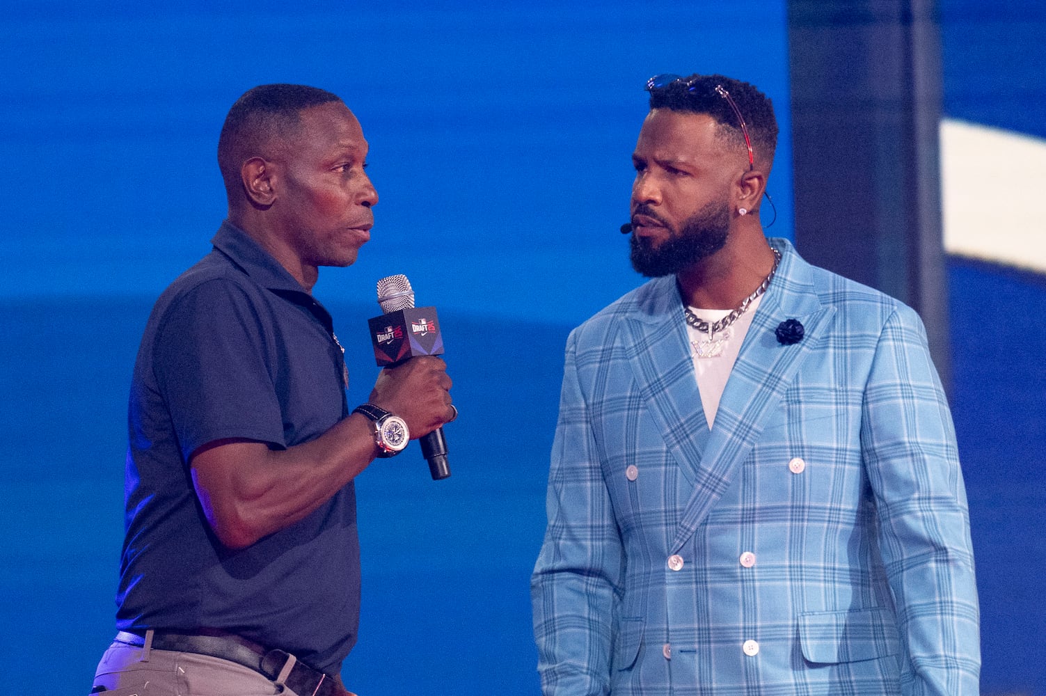 Former Atlanta Braves outfielder Kenny Lofton (left) speaks with host Xavier Scruggs during the 2025 MLB Draft Sunday, July 13, 2025 at the Coca-Cola Roxy in Atlanta. (Daniel Varnado/For the Atlanta Journal-Constitution)
