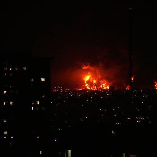 Flames rise from an oil storage facility south of the capital Tehran as strikes hit the city during the U.S.–Israel military campaign, Iran, Saturday, March 7, 2026. (AP Photo/Vahid Salemi)