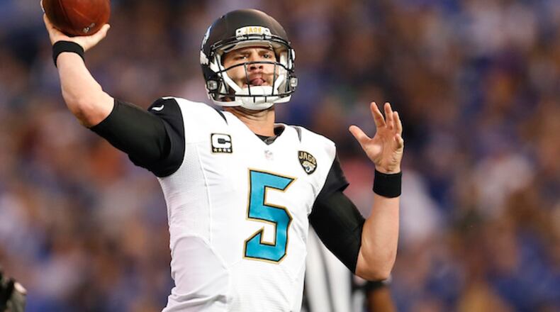 Jacksonville Jaguars quarterback Blake Bortles (5) throws a 14-yard touchdown pass during the first half against the Indianapolis Colts at Lucas Oil Stadium in Indianapolis on Sunday, Jan. 1, 2017. (Sam Riche/TNS)