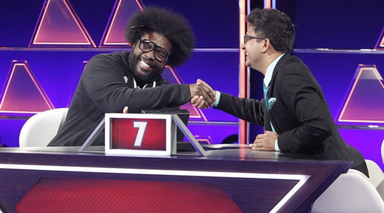 Archith Sheshadri (right) recently moved back to Atlanta after spending the last 2 years working as a news anchor for a global news network in India. Here, he’s competing in the $100,000 Pyramid with Questlove.