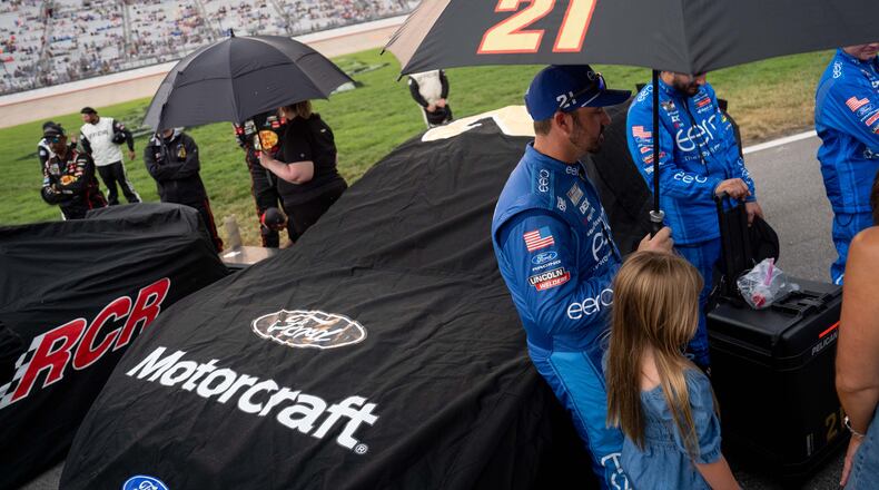 Josh Berry waits out the rain before a NASCAR Cup Series auto race, Sunday, May 31, 2026, in Lebanon, Tenn. (AP Photo/Camden Hall)