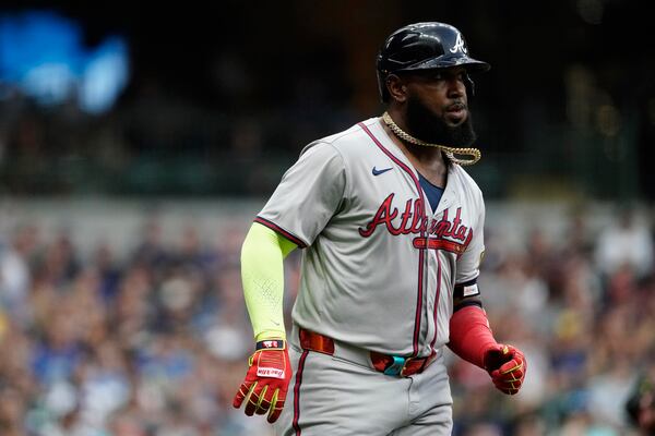 Atlanta Braves' Marcell Ozuna jogs to first after hitting an RBI single during the third inning of a baseball game against the Milwaukee Brewers, Tuesday, July 30, 2024, in Milwaukee. (AP Photo/Aaron Gash)
