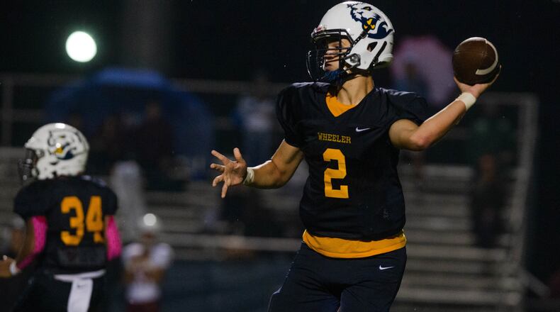 QB Alex Stack connected with Jordan McInnis on a 10-yard touchdown with 5:05 to play that provided the winning points in Wheeler's 13-12 victory over Lassiter Friday.