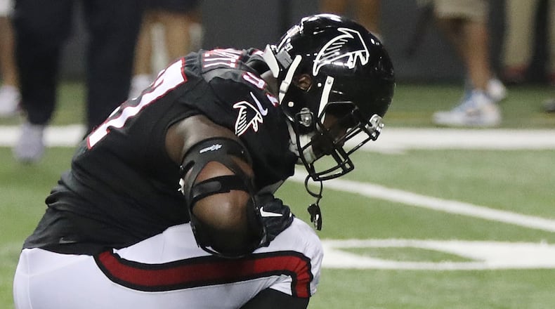 Falcons Grady Jarrett reacts as the Chargers sudden death field goal clears for a 33-30 victory over the Falcons in an NFL football game on Sunday, Oct. 23, 2016, in Atlanta.