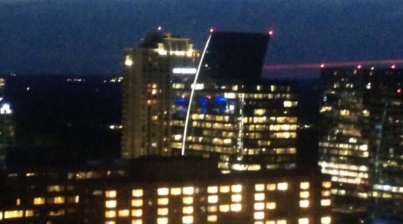 Myra McElhaney of Atlanta took this shot of the Whitley Hotel in Buckhead lit with the word HOPE with her cellphone from the roof top terrace of her Buckhead condo. "It's encouraging to see a message of hope each night," she wrote.
,