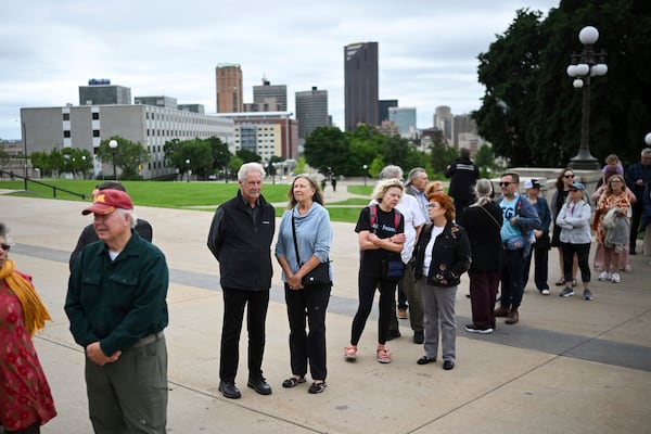 People line up to pay their respect to former Minnesota House Speaker Melissa Hortman, who will lie in state with her husband, Mark, and their golden retriever, Gilbert at the Minnesota Capitol rotunda on Friday, June 17, 2025 in St. Paul, Minn. (Aaron Lavinsky/Star Tribune via AP)