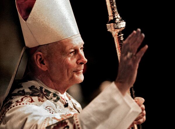 Theodore McCarrick greets St. Matthews Cathedral during his installation as archbishop of Washington in 2001. MUST CREDIT: Washington Post photo by Michael S. Williamson