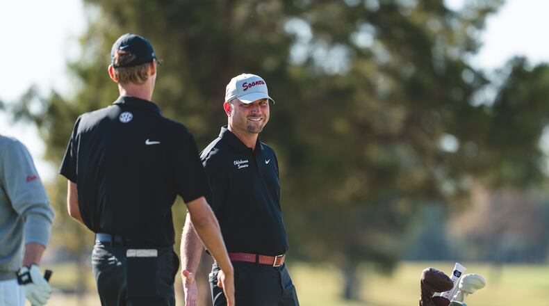 Oklahoma men's golf coach Ryan Hybl (center) was named Georgia Tech's new golf coach Sunday, May 24, 2026. He will succeed Bruce Heppler, who retired after 31 seasons at the helm of the Yellow Jackets' highly successful program. (Courtesy of Oklahoma Athletics)