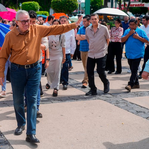 FILE - Sinaloa state Gov. Ruben Rocha waves as he takes part in an annual earthquake drill in Culiacan, Mexico, Sept. 19, 2024. (AP Photo/Eduardo Verdugo, File)