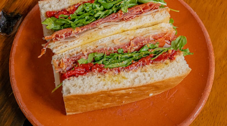 The pan de jamon y queso at El Super Pan’s Ponce City Market location is a ham and cheese sandwich with a Spanish accent. Courtesy of the Imprints