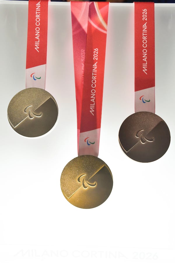 Milano Cortina 2026 Winter Paralympics medals are displayed during the unveiling ceremony in Venice, Italy, Tuesday, July 15, 2025. (AP Photo/Luigi Costantini)