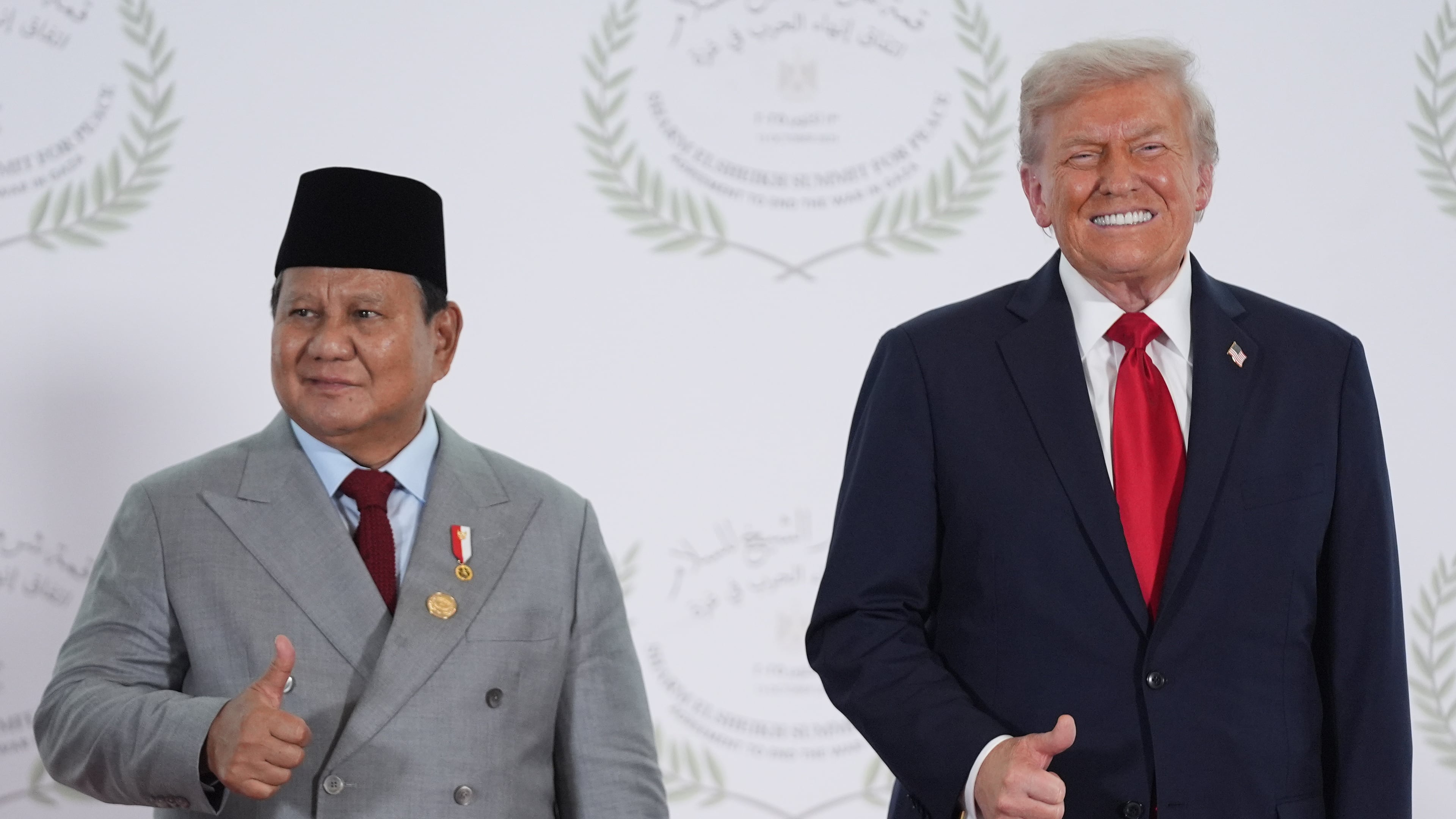 President Donald Trump greets Indonesia's President Prabowo Subianto during a summit to support ending the more than two-year Israel-Hamas war in Gaza after a breakthrough ceasefire deal, Monday, Oct. 13, 2025, in Sharm El Sheikh, Egypt. (AP Photo/Evan Vucci, Pool)