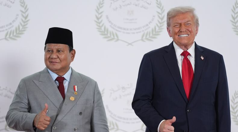 President Donald Trump greets Indonesia's President Prabowo Subianto during a summit to support ending the more than two-year Israel-Hamas war in Gaza after a breakthrough ceasefire deal, Monday, Oct. 13, 2025, in Sharm El Sheikh, Egypt. (AP Photo/Evan Vucci, Pool)