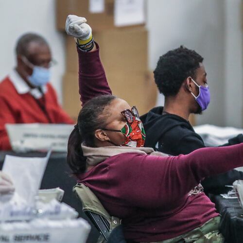 Fulton County election workers count ballots at State Farm Arena in 2020. (John Spink/AJC)