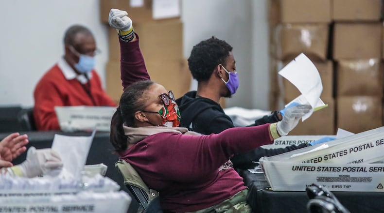 Fulton County election workers count ballots at State Farm Arena in 2020. (John Spink/AJC)