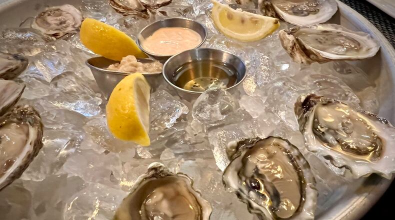 Mac's Raw Bar on Marietta Square serves a good selection of raw oysters. Henri Hollis/henri.hollis@ajc.com