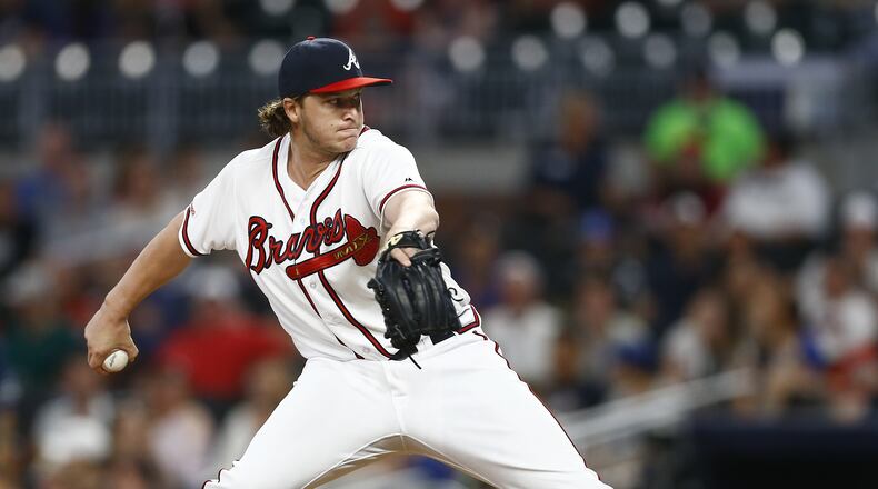 A day after picking up his first victory, Jacob Webb closed out Monday's game for his first save. (Photo by Mike Zarrilli/Getty Images)