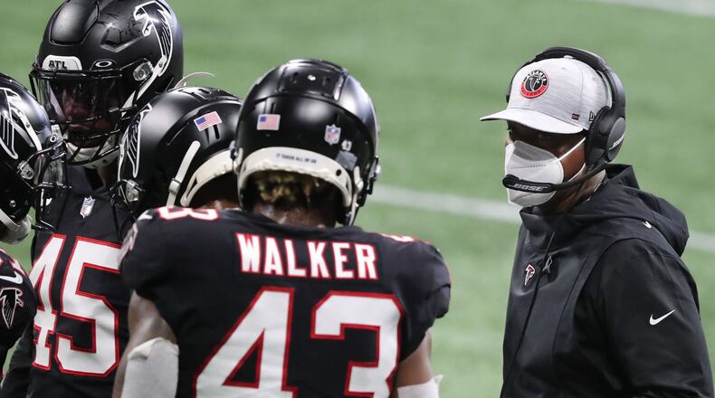 Falcons interim head coach Raheem Morris addresses the defense during a time out against the New Orleans Saints during the second quarter Sunday, Dec. 6, 2020, at Mercedes-Benz Stadium in Atlanta. (Curtis Compton / Curtis.Compton@ajc.com)