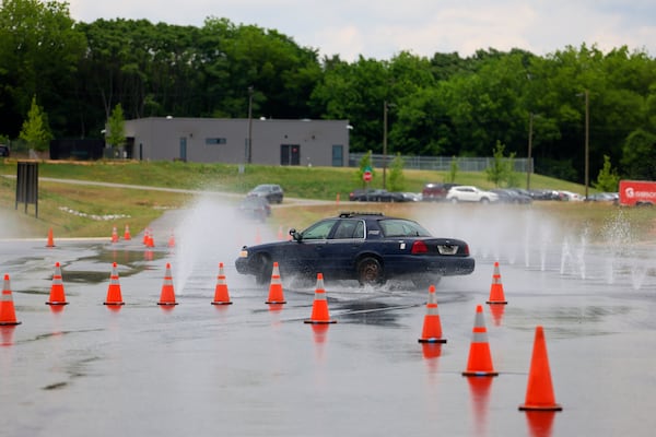 An Atlanta Police Department automobile trains on the Skid Pad at the Atlanta Public Safety Training Center, Monday, May 11, 2026, in Atlanta, Ga. (Jason Getz/AJC)