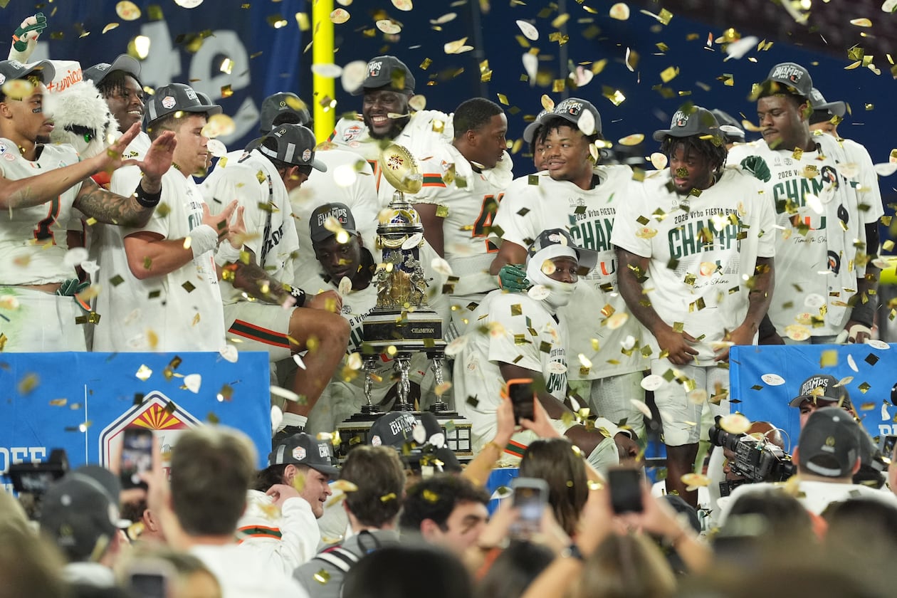 Miami players celebrate after beating Ole Miss — the last SEC team in the College Football Playoff bracket — in the Fiesta Bowl CFP semifinal game on Thursday, Jan. 8, 2026, in Glendale, Ariz. (Ross D. Franklin/AP)